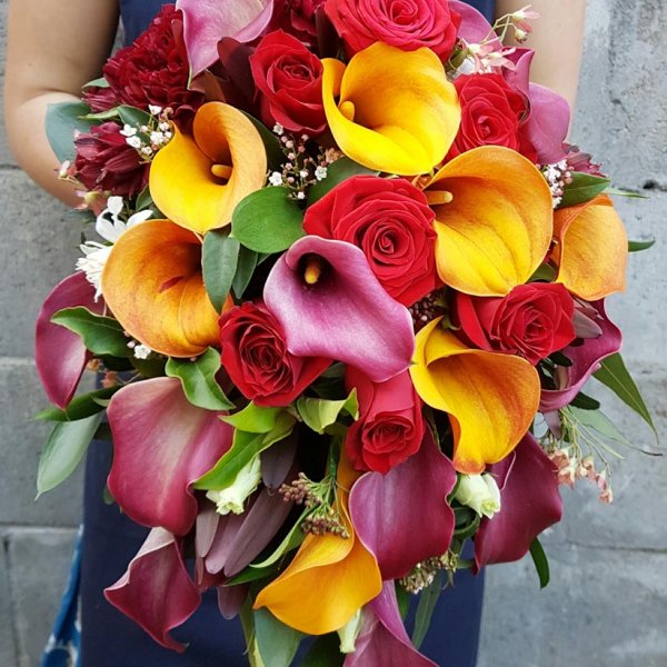Colourful calla teardrop bouquet
